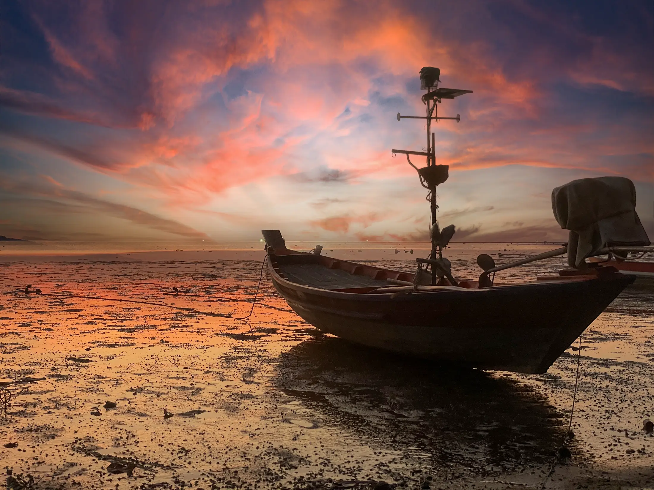 Longtail boat at sunset Koh Phangan — how long to stay